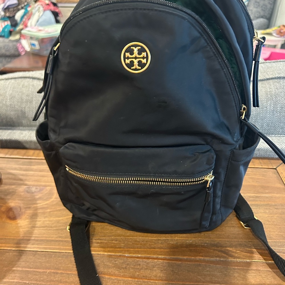 Tory Burch Black and Gold Backpack Sleek Design